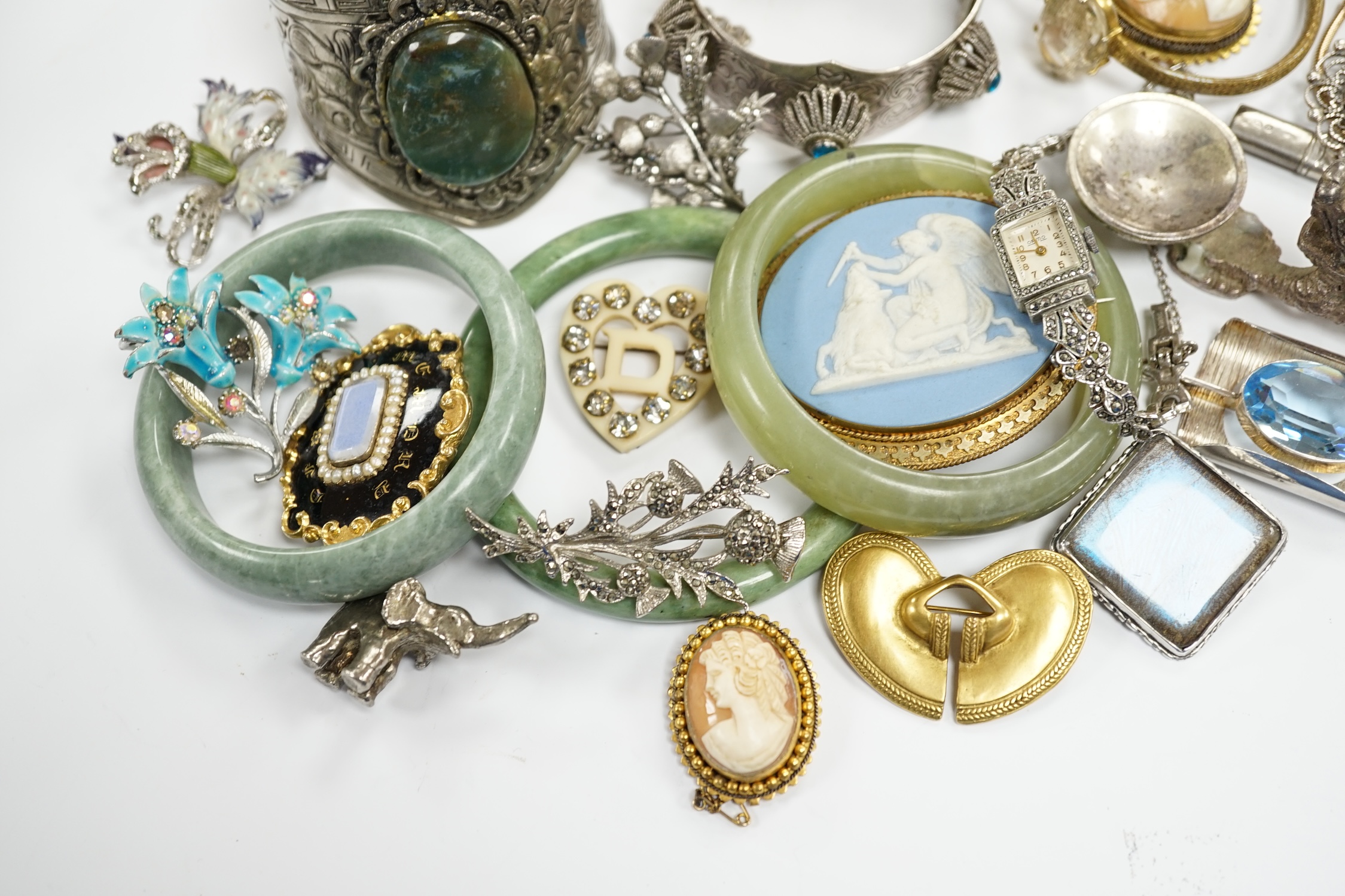 A collection of white metal and mixed costume jewellery, including bracelets, necklaces, bangles etc and a silver cased pair of scissors.